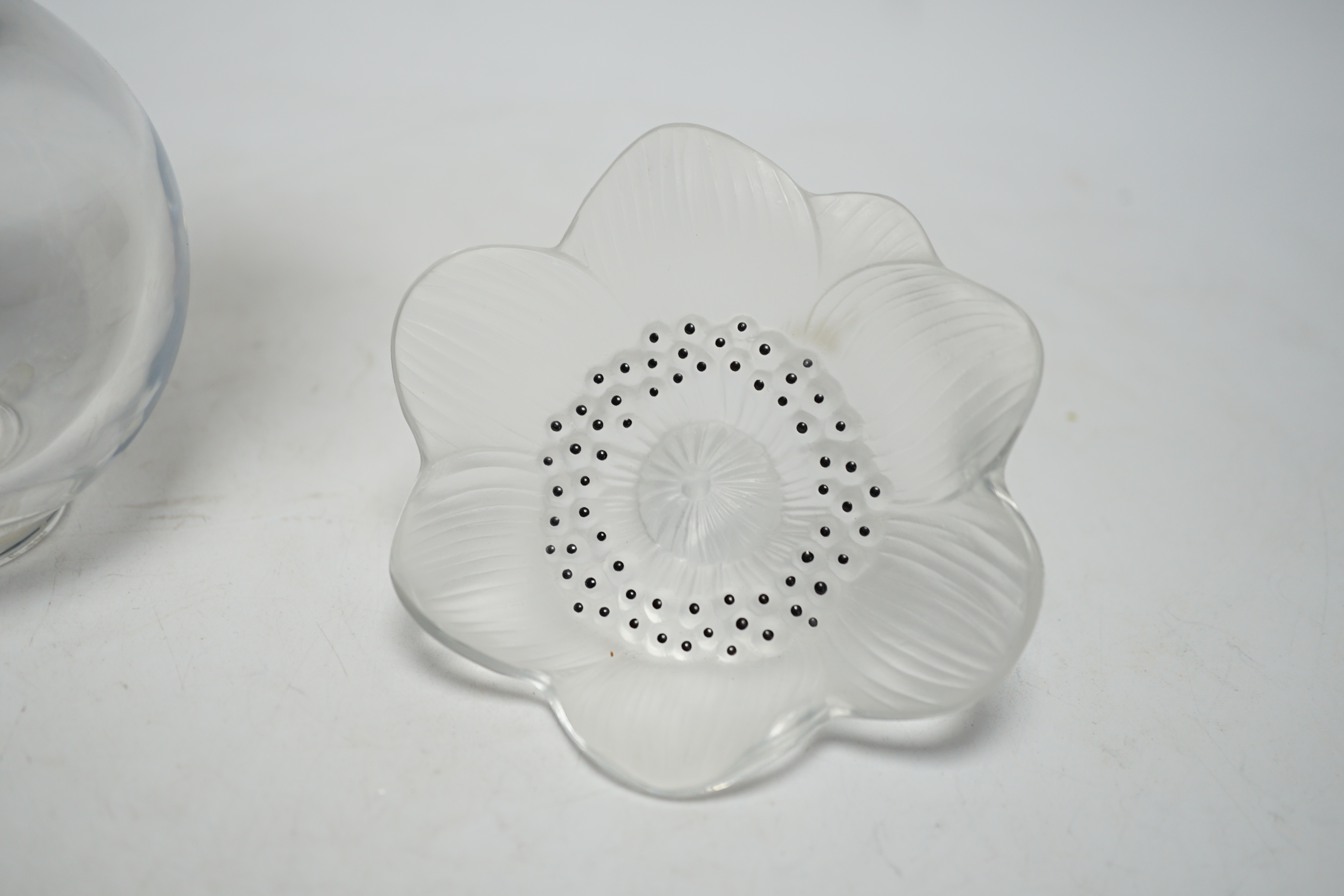 A Lalique anemone glass scent bottle and stopper, signed to the base, together with an associated anemone stopper, 16cm high